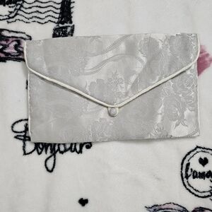Jessica McClintock Silver Floral Clutch